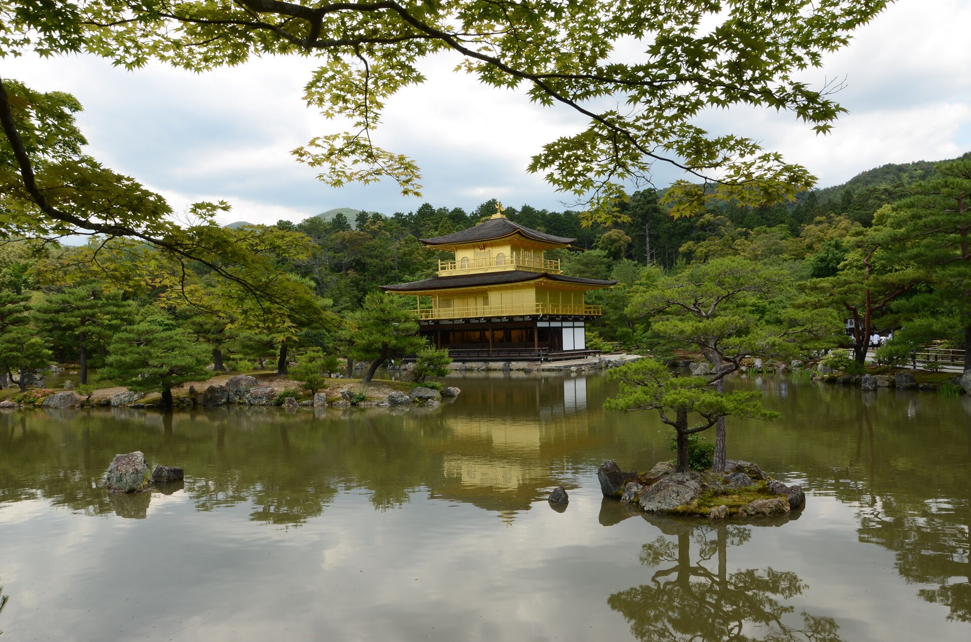 Close view of the gold-leafed upper floors of the Golden Pavilion