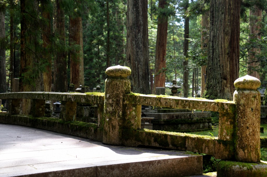 A stone bridge on the forest approach through Okunoin cemetery