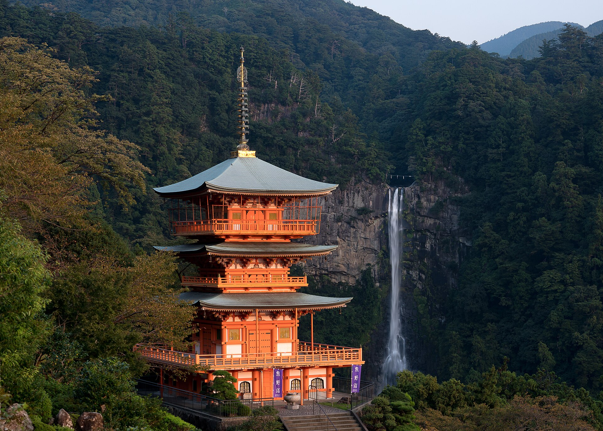 The three-storied pagoda of Seiganto-ji with Nachi Falls behind it
