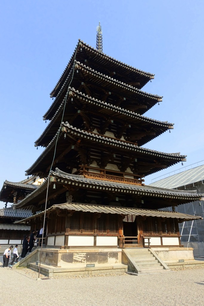 The five-story pagoda of Hōryū-ji rising against the sky