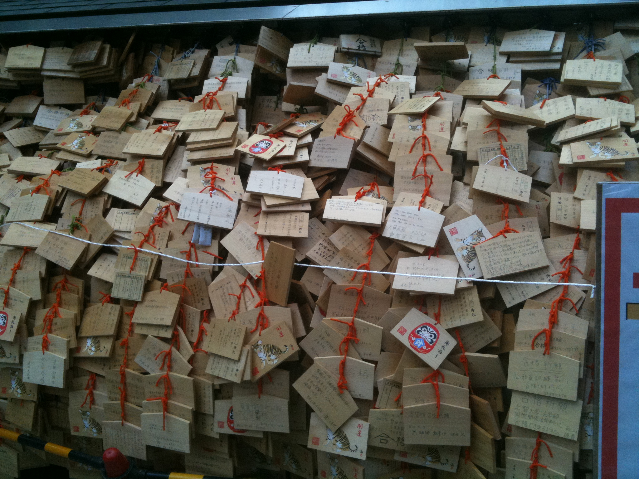 Ema plaques covered in exam-success wishes at Yushima Tenmangu, a Tenjin shrine in Tokyo