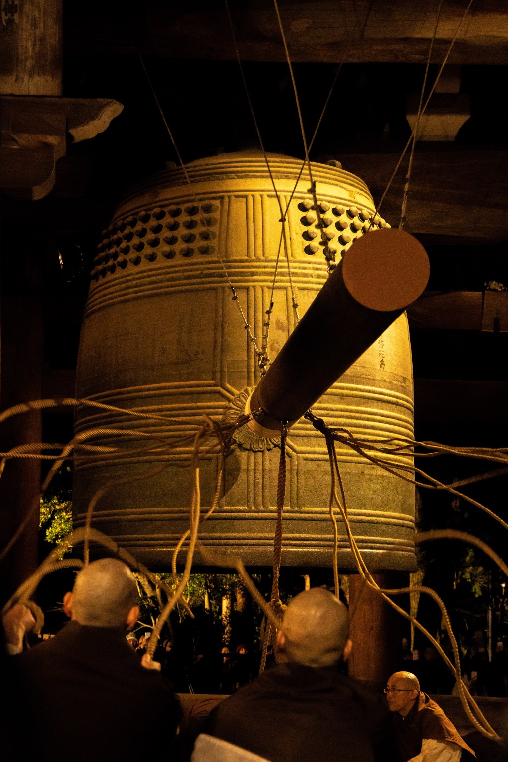 Monks ringing the great bell of Chion-in in Kyoto on New Year's Eve